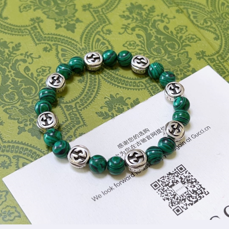 G*u*i bracelets